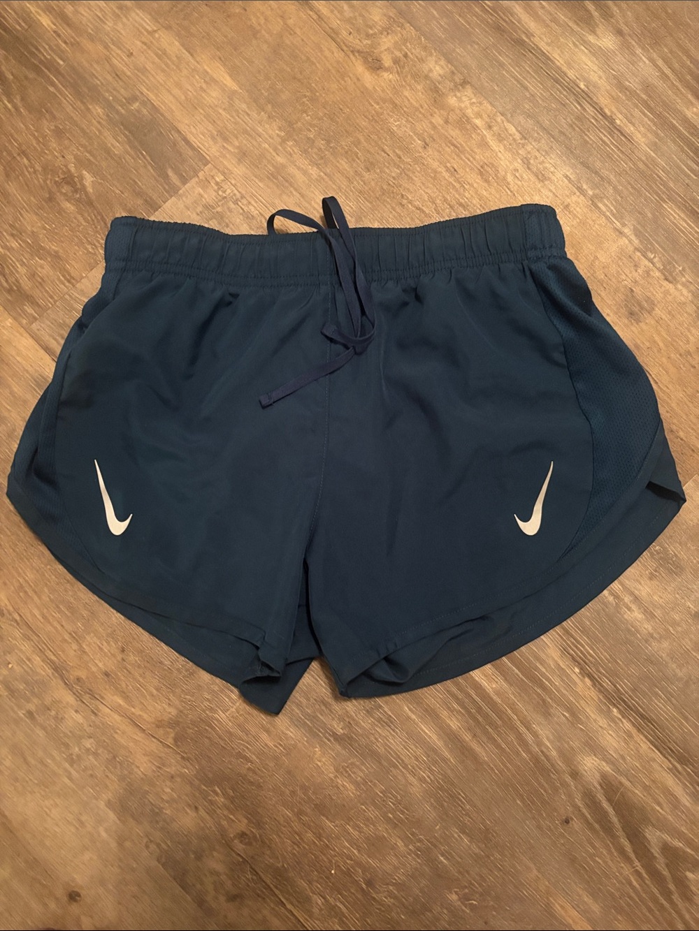 Nike Women's Dark Blue Athletic Running Shorts with White Swoosh
